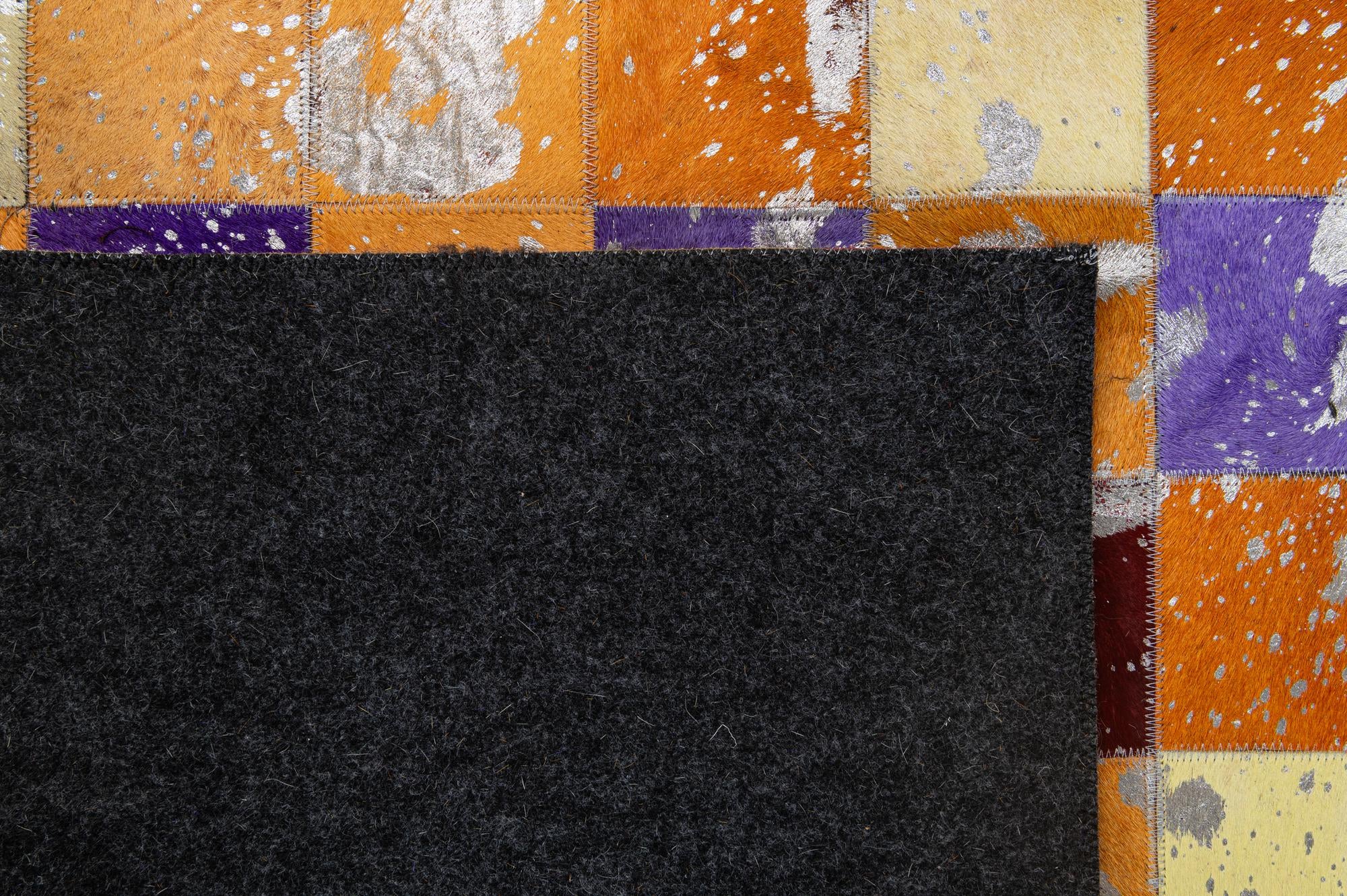 4' 11 x 7' 10 Cowhide - Patchwork Rug