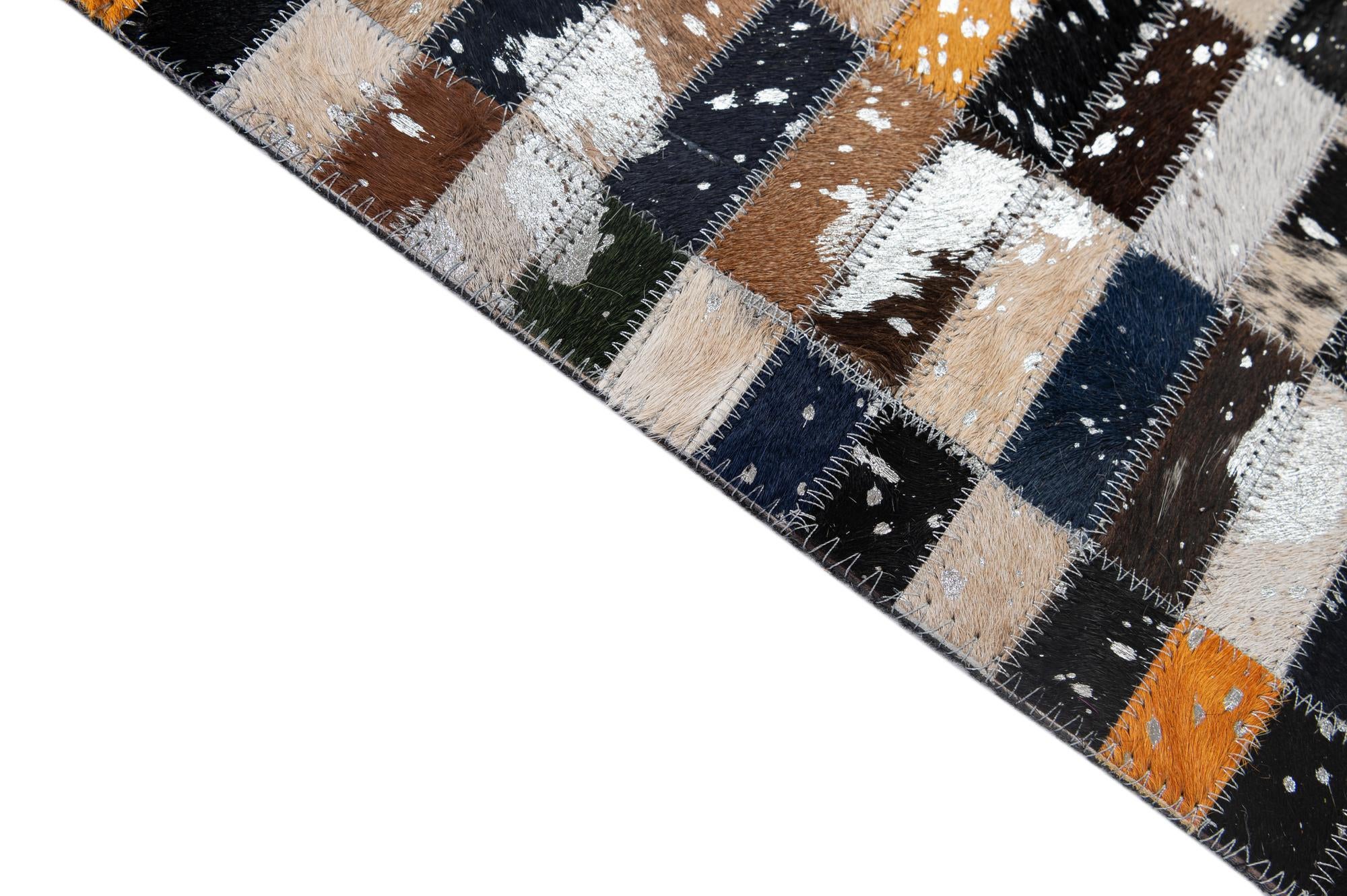5' 2 x 8' 1 Cowhide - Patchwork Rug