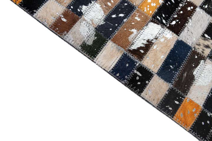 5' 2 x 8' 1 Cowhide - Patchwork Rug