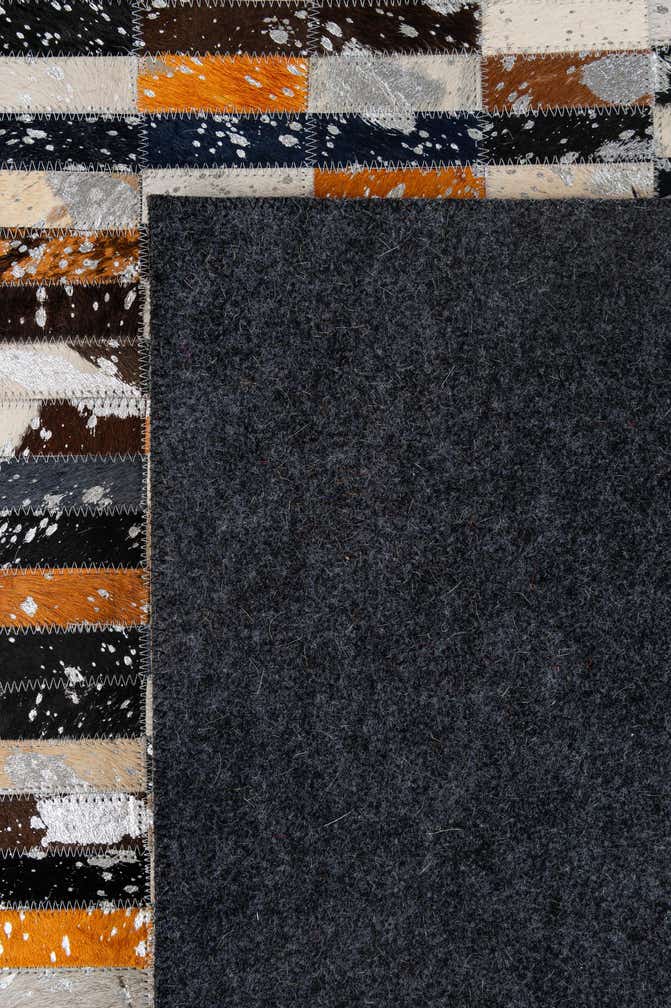 5' 2 x 8' 1 Cowhide - Patchwork Rug