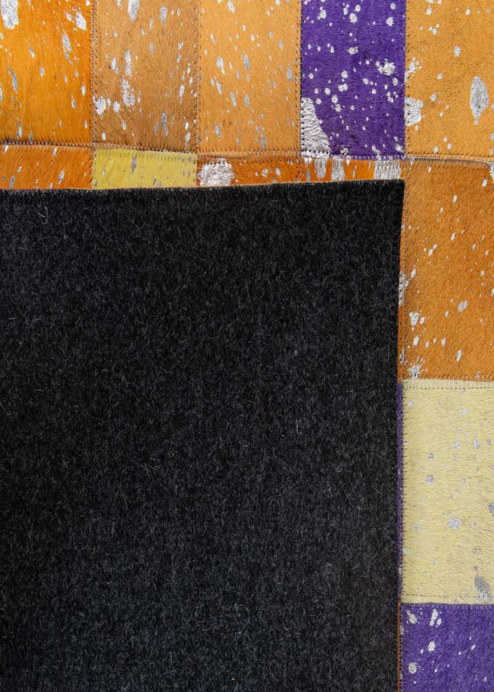 4' 11 x 7' 10 Cowhide - Patchwork Rug