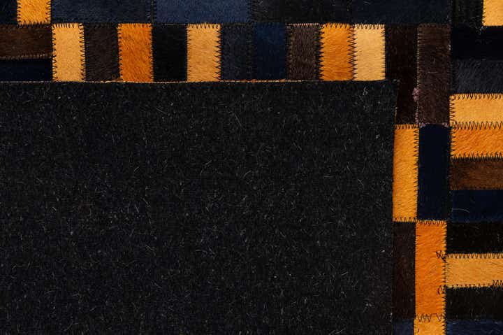 4' 11 x 7' 11 Cowhide - Patchwork Rug