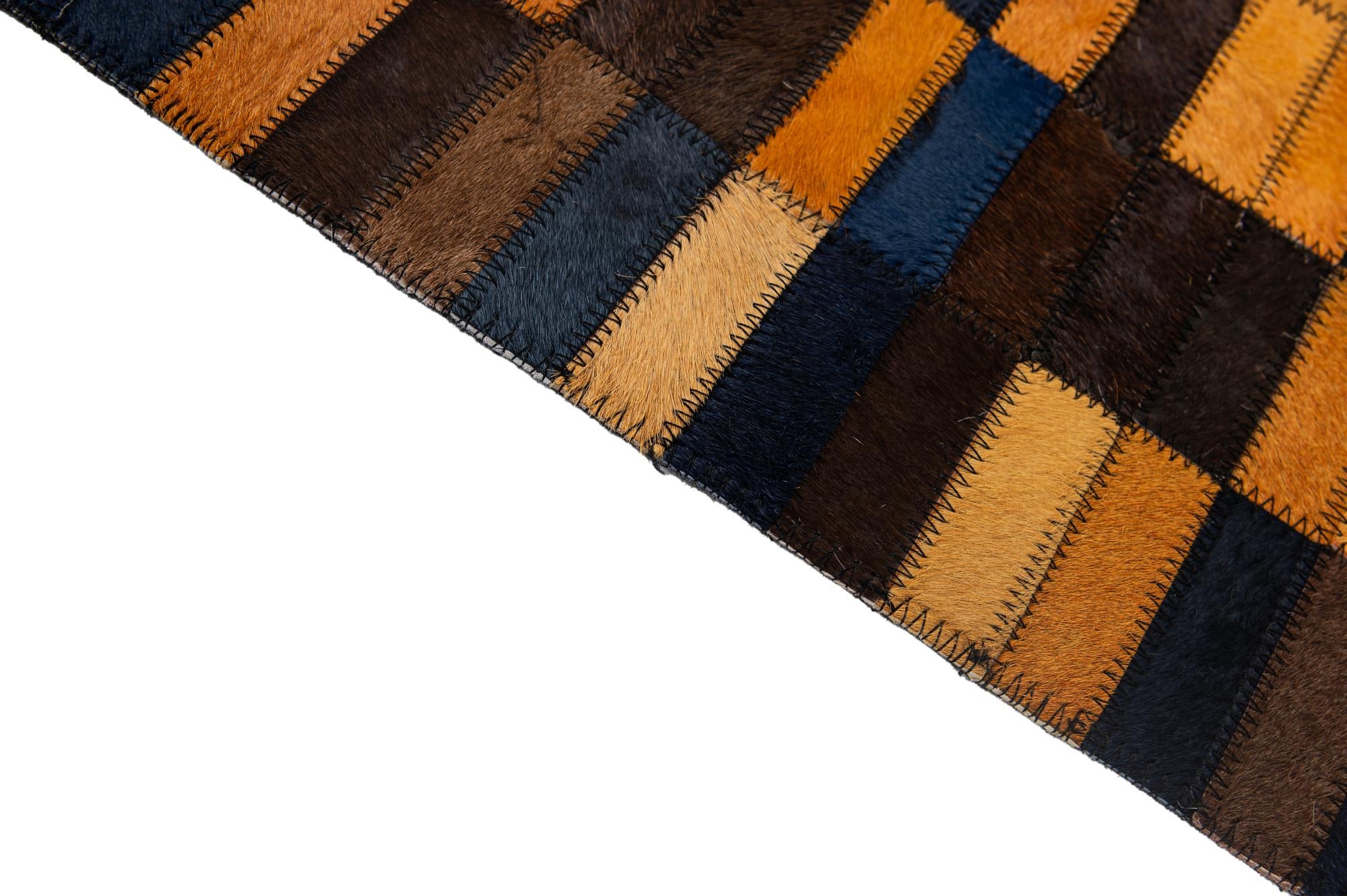 4' 11 x 7' 10 Cowhide - Patchwork Rug