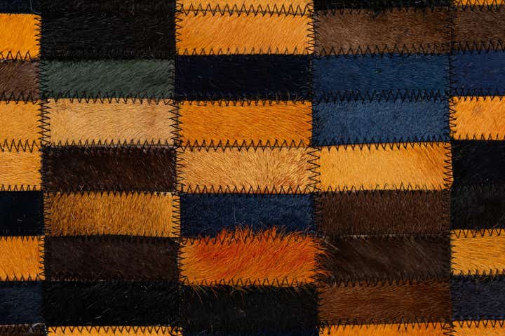 4' 11 x 7' 10 Cowhide - Patchwork Rug