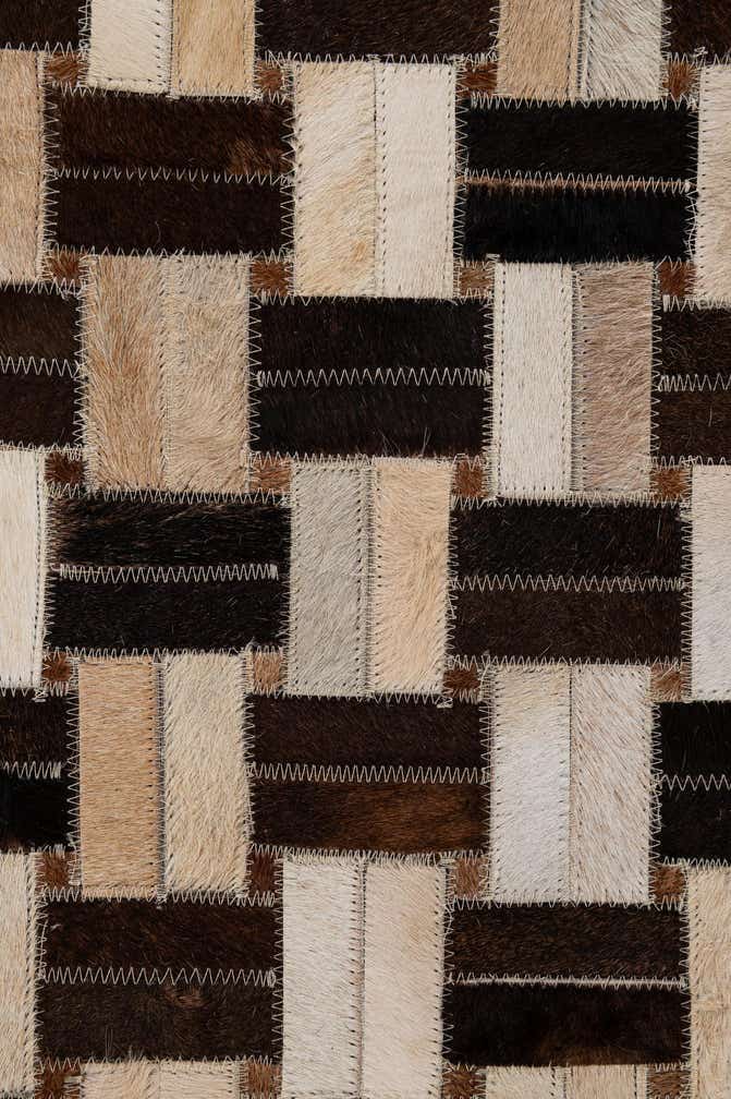4' 11 x 7' 10 Cowhide - Patchwork Rug