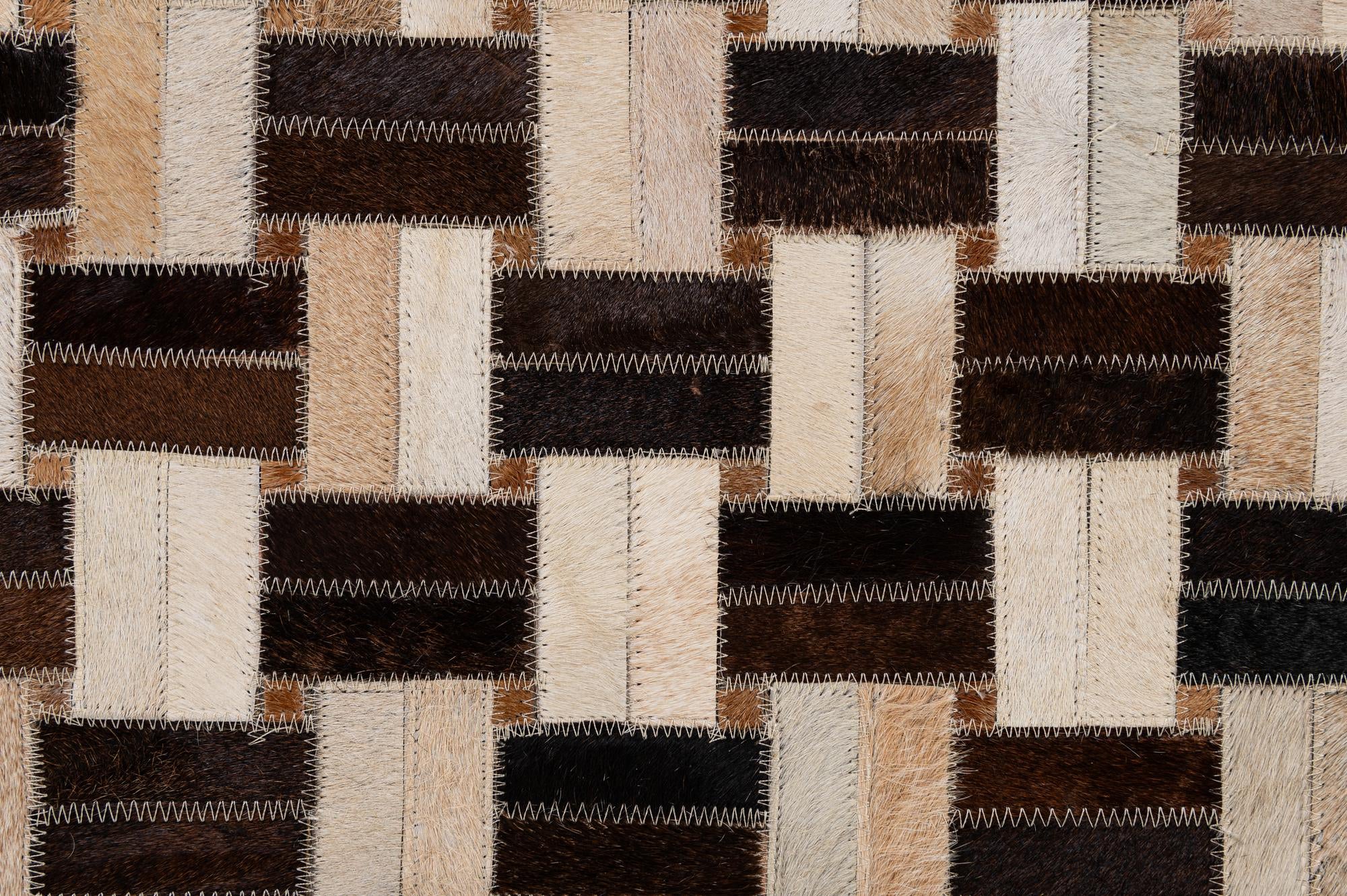4' 11 x 7' 10 Cowhide - Patchwork Rug