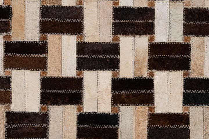 4' 11 x 7' 10 Cowhide - Patchwork Rug