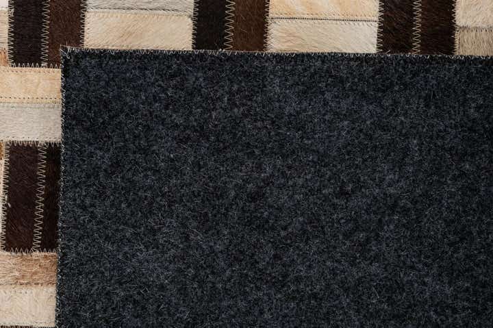 4' 11 x 7' 10 Cowhide - Patchwork Rug