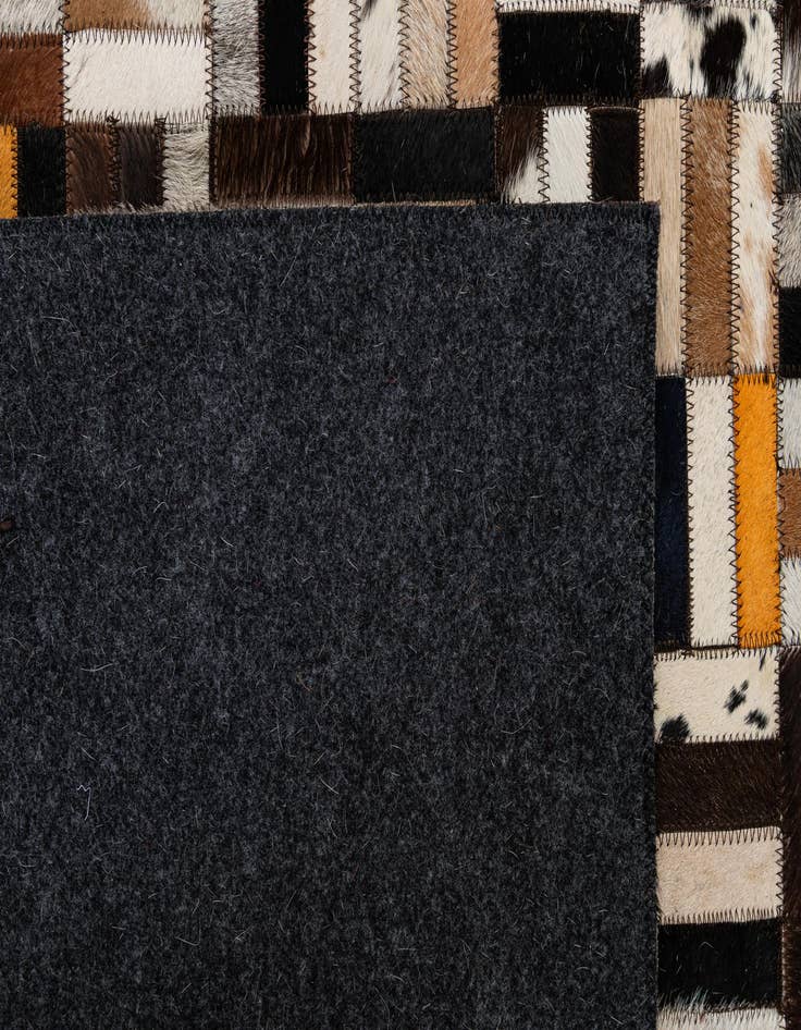 Detail image of 5' 3 x 8' Cowhide - Patchwork Rug