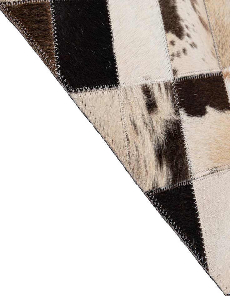 Detail image of 5' 1 x 8' Cowhide - Patchwork Rug