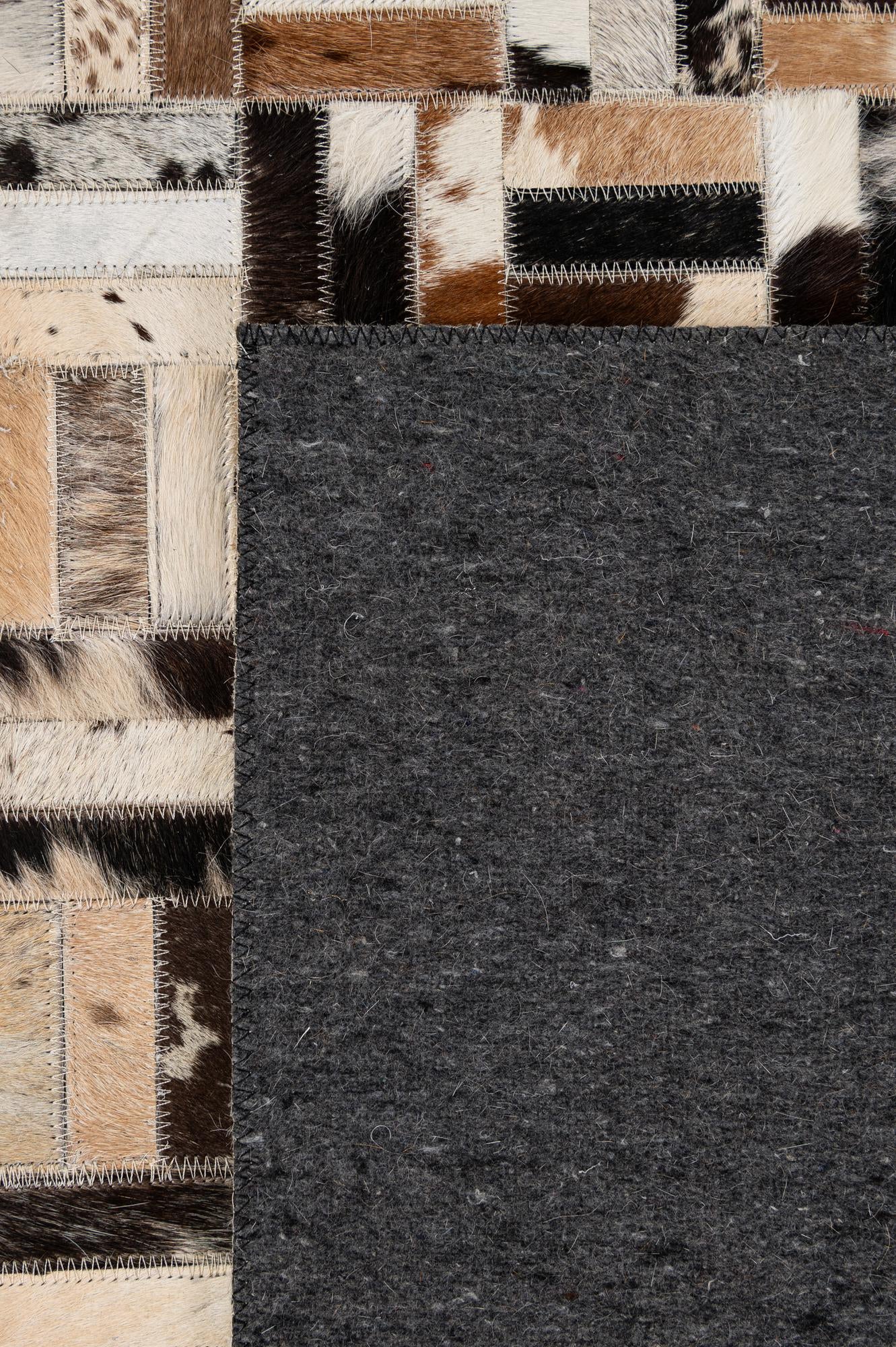 5' 1 x 8' Cowhide - Patchwork Rug