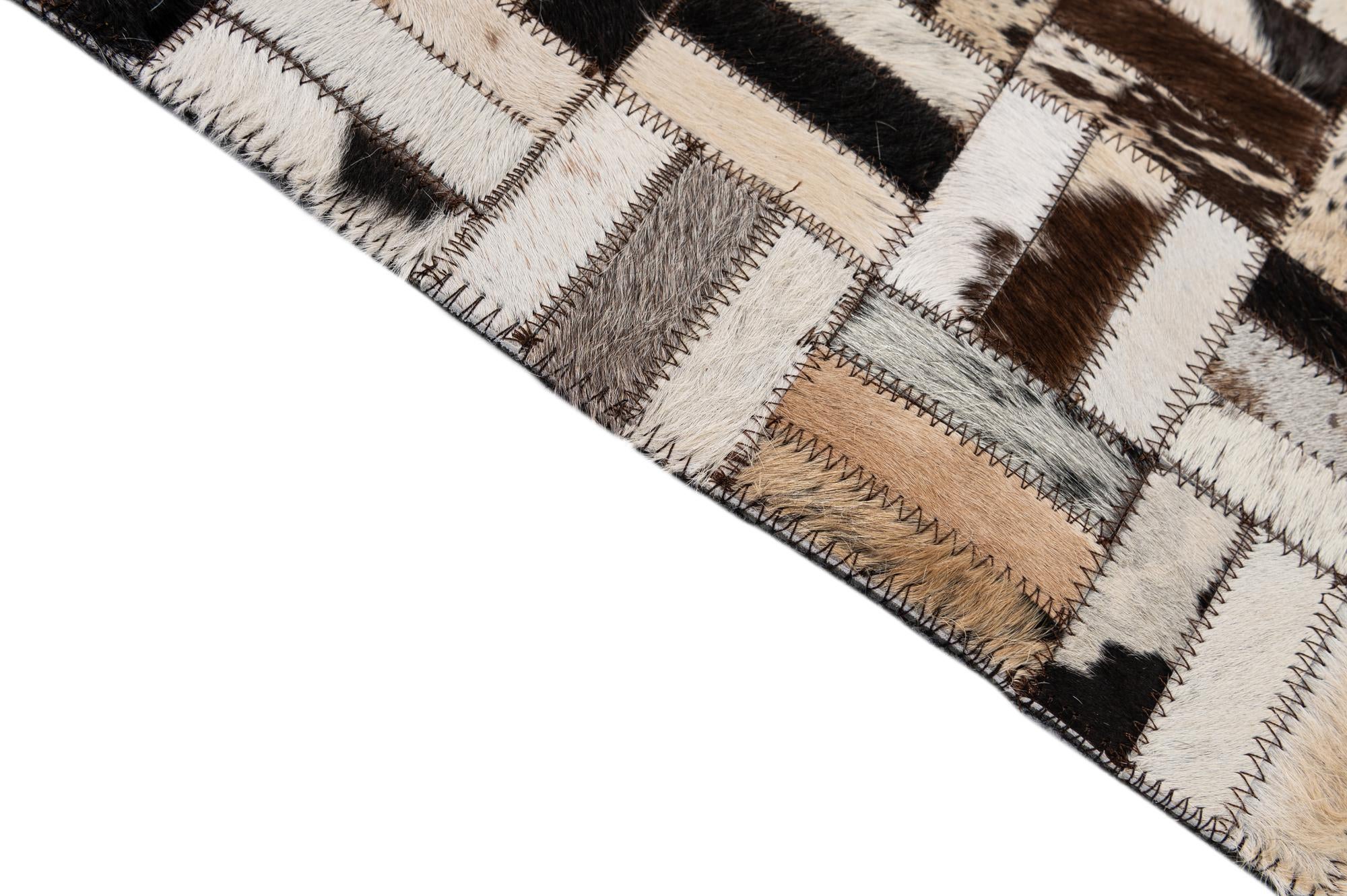 5' x 7' 11 Cowhide - Patchwork Rug