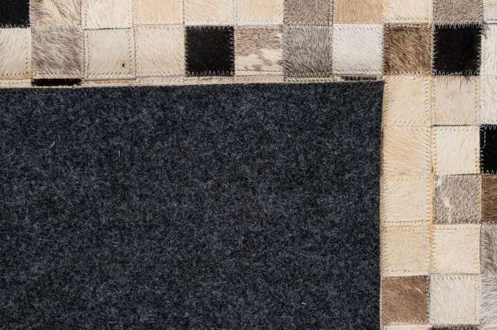 5' 3 x 8' 1 Cowhide - Patchwork Rug