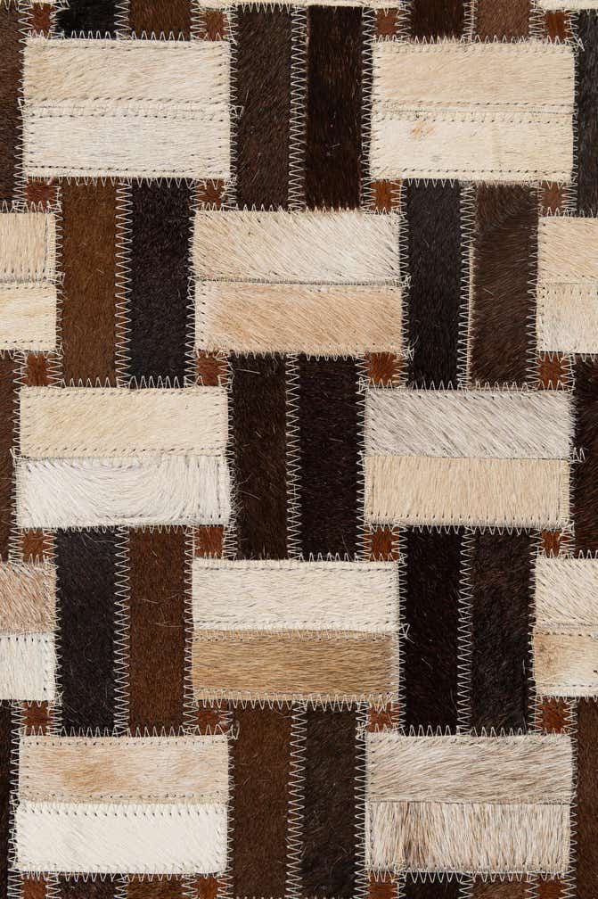 4' 11 x 7' 10 Cowhide - Patchwork Rug