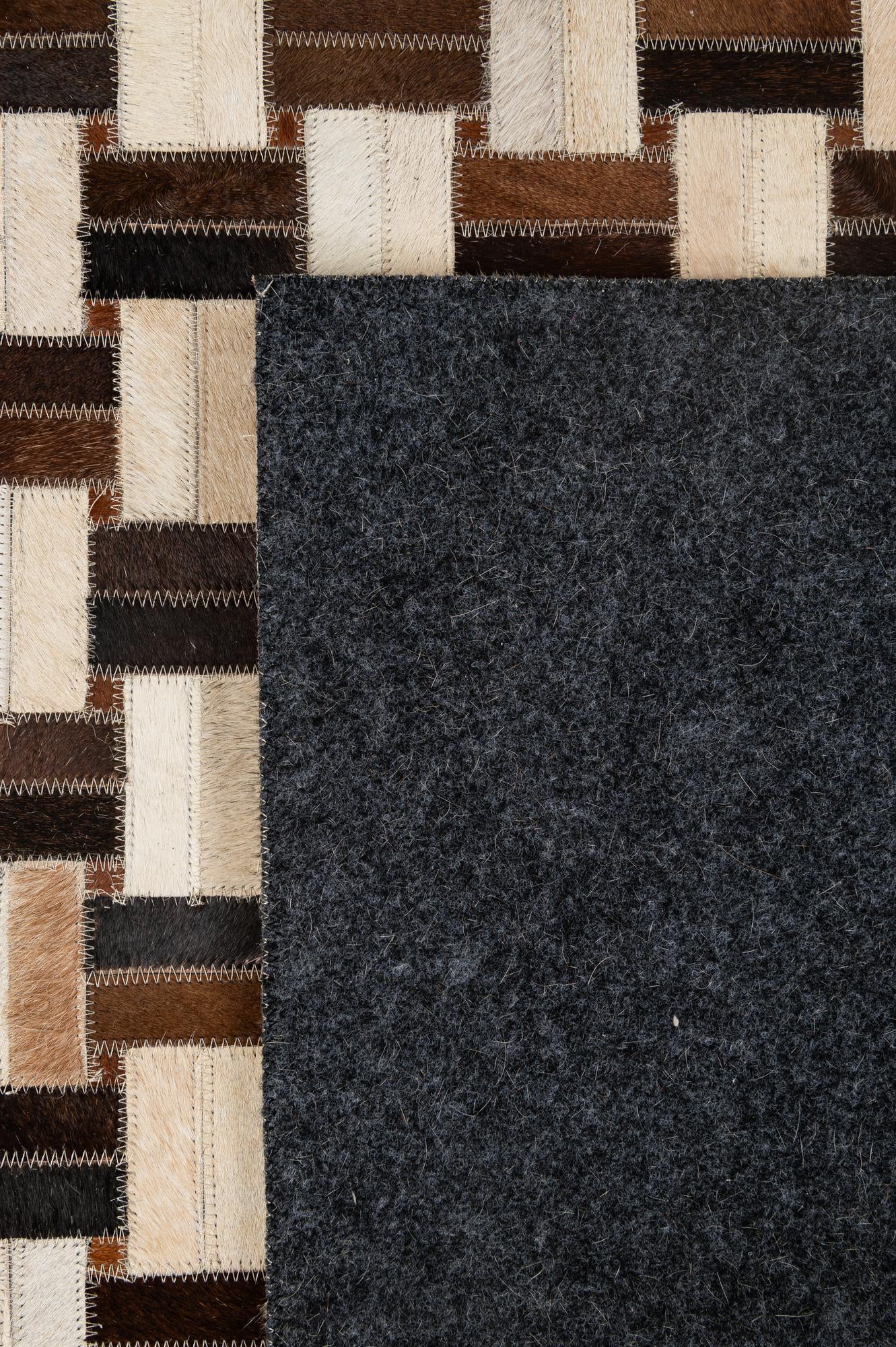 4' 11 x 7' 10 Cowhide - Patchwork Rug