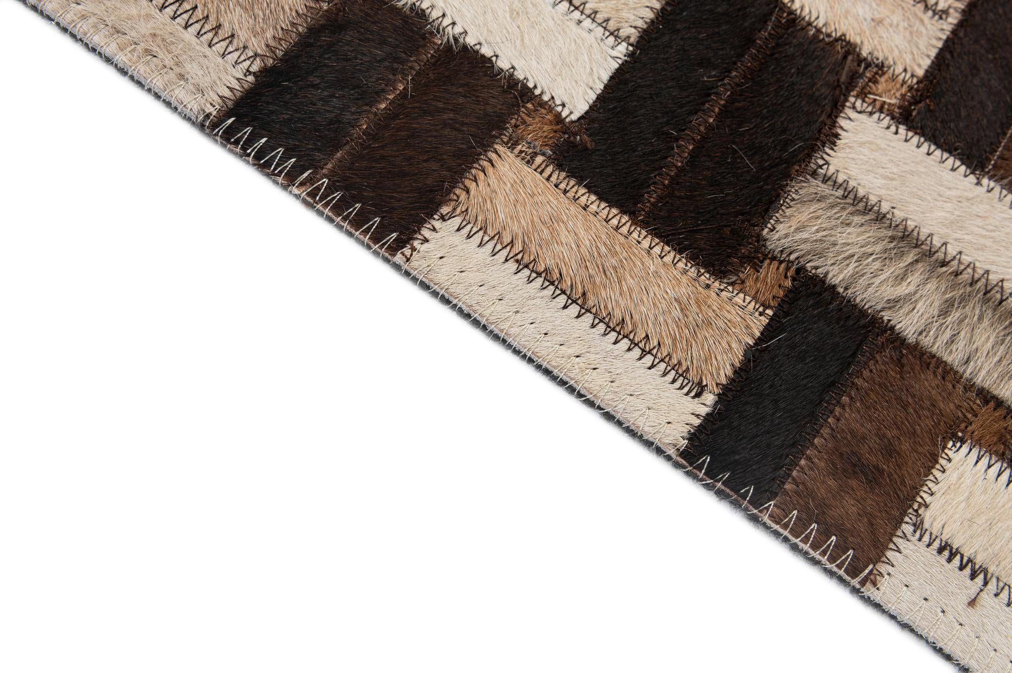 4' 11 x 7' 10 Cowhide - Patchwork Rug