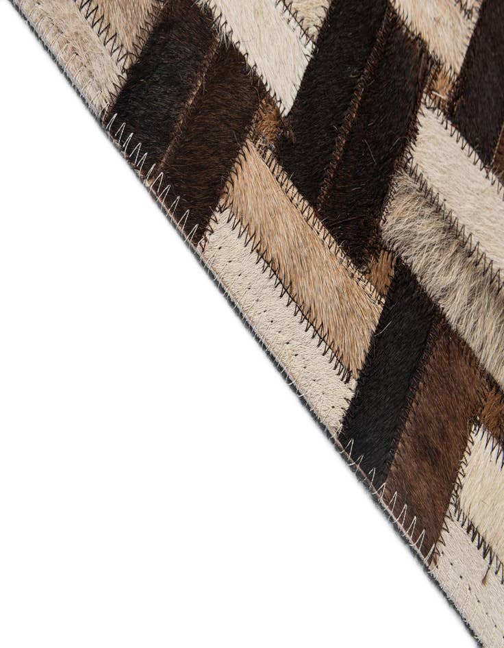 Detail image of 4' 11 x 7' 10 Cowhide - Patchwork Rug
