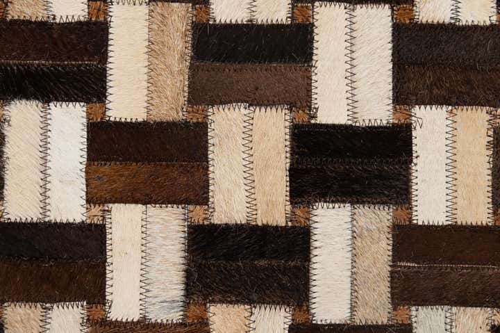 4' 11 x 7' 10 Cowhide - Patchwork Rug