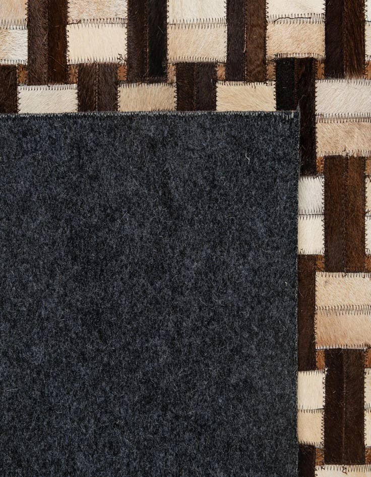 Detail image of 4' 11 x 7' 10 Cowhide - Patchwork Rug