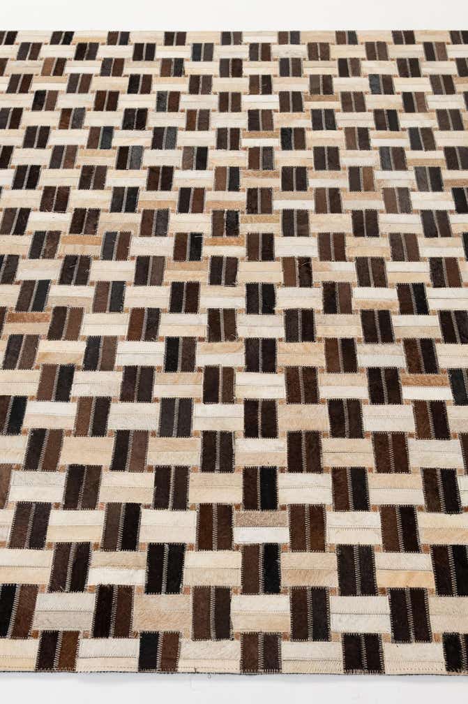 4' 11 x 7' 10 Cowhide - Patchwork Rug