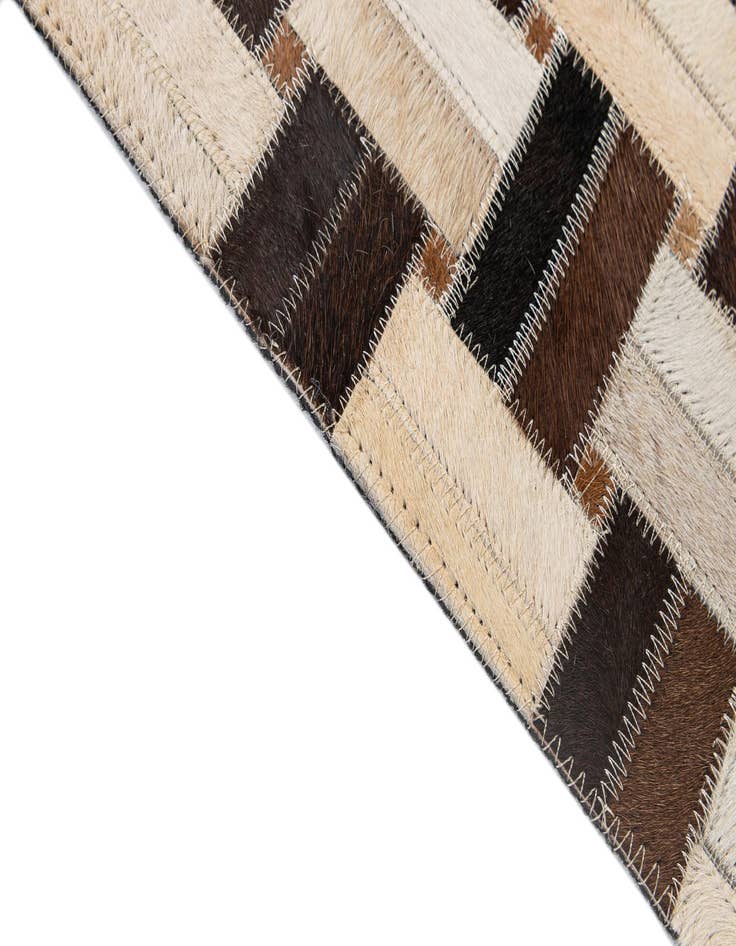 Detail image of 4' 11 x 7' 10 Cowhide - Patchwork Rug
