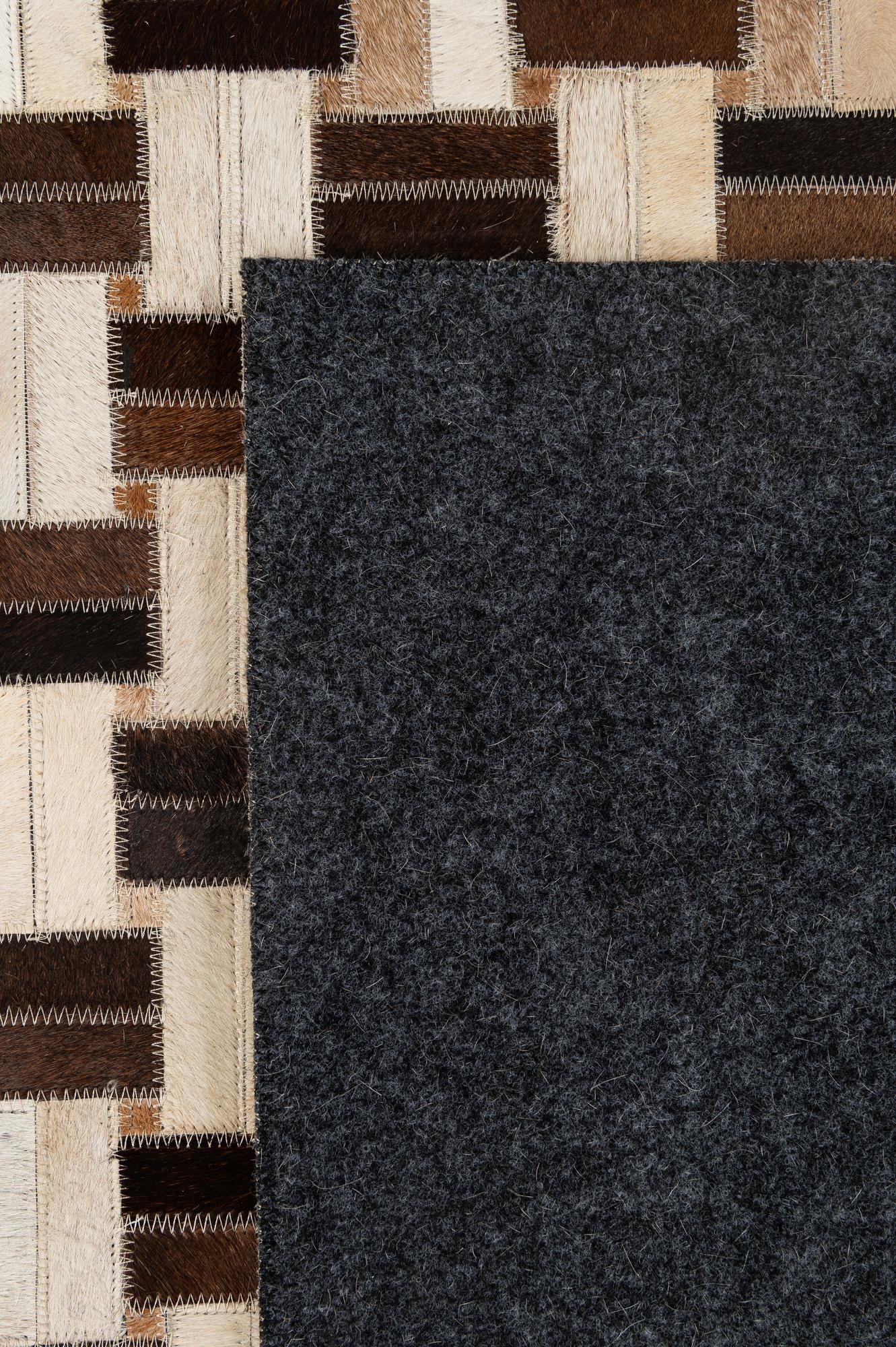 4' 11 x 7' 10 Cowhide - Patchwork Rug