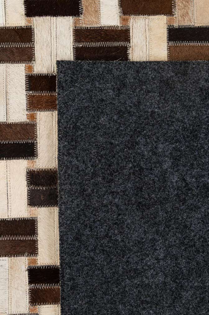 4' 11 x 7' 10 Cowhide - Patchwork Rug