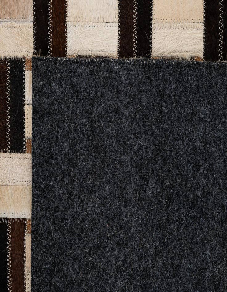 Detail image of 4' 11 x 7' 10 Cowhide - Patchwork Rug