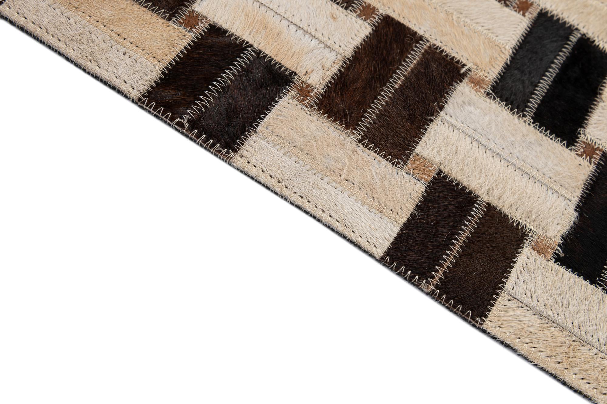 5' x 7' 9 Cowhide - Patchwork Rug