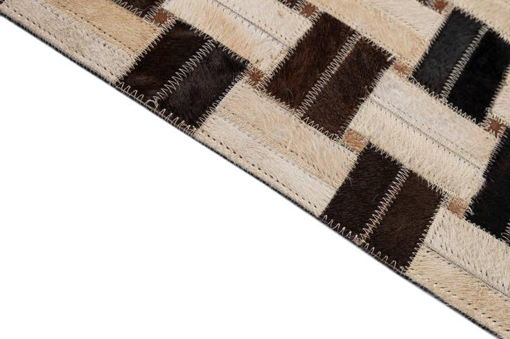 Detail image of 5' x 7' 9 Cowhide - Patchwork Rug