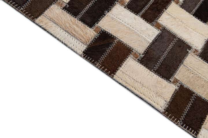 4' 11 x 7' 9 Cowhide - Patchwork Rug