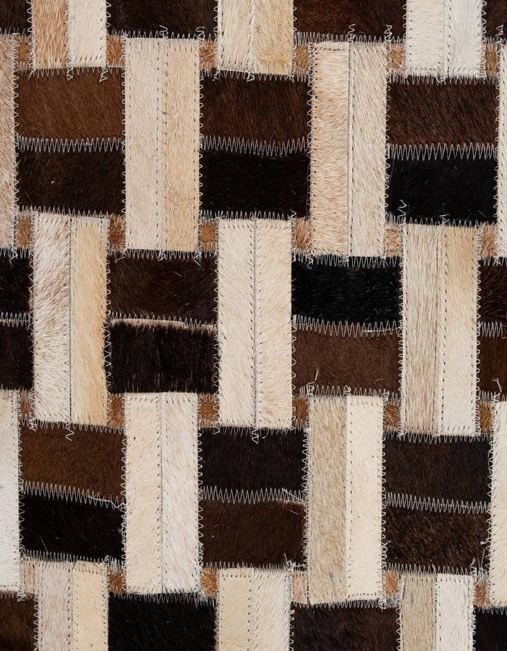 Detail image of 4' 11 x 7' 9 Cowhide - Patchwork Rug