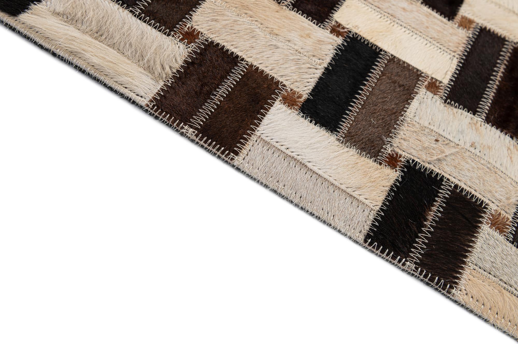 4' 11 x 7' 9 Cowhide - Patchwork Rug