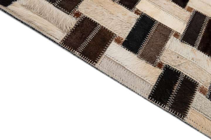 4' 11 x 7' 9 Cowhide - Patchwork Rug