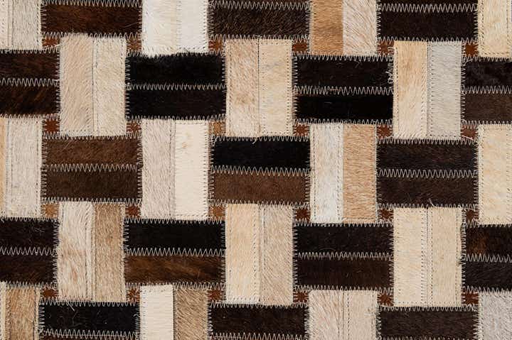 4' 11 x 7' 9 Cowhide - Patchwork Rug