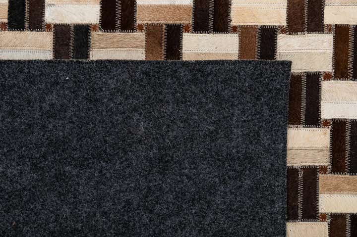 4' 11 x 7' 9 Cowhide - Patchwork Rug