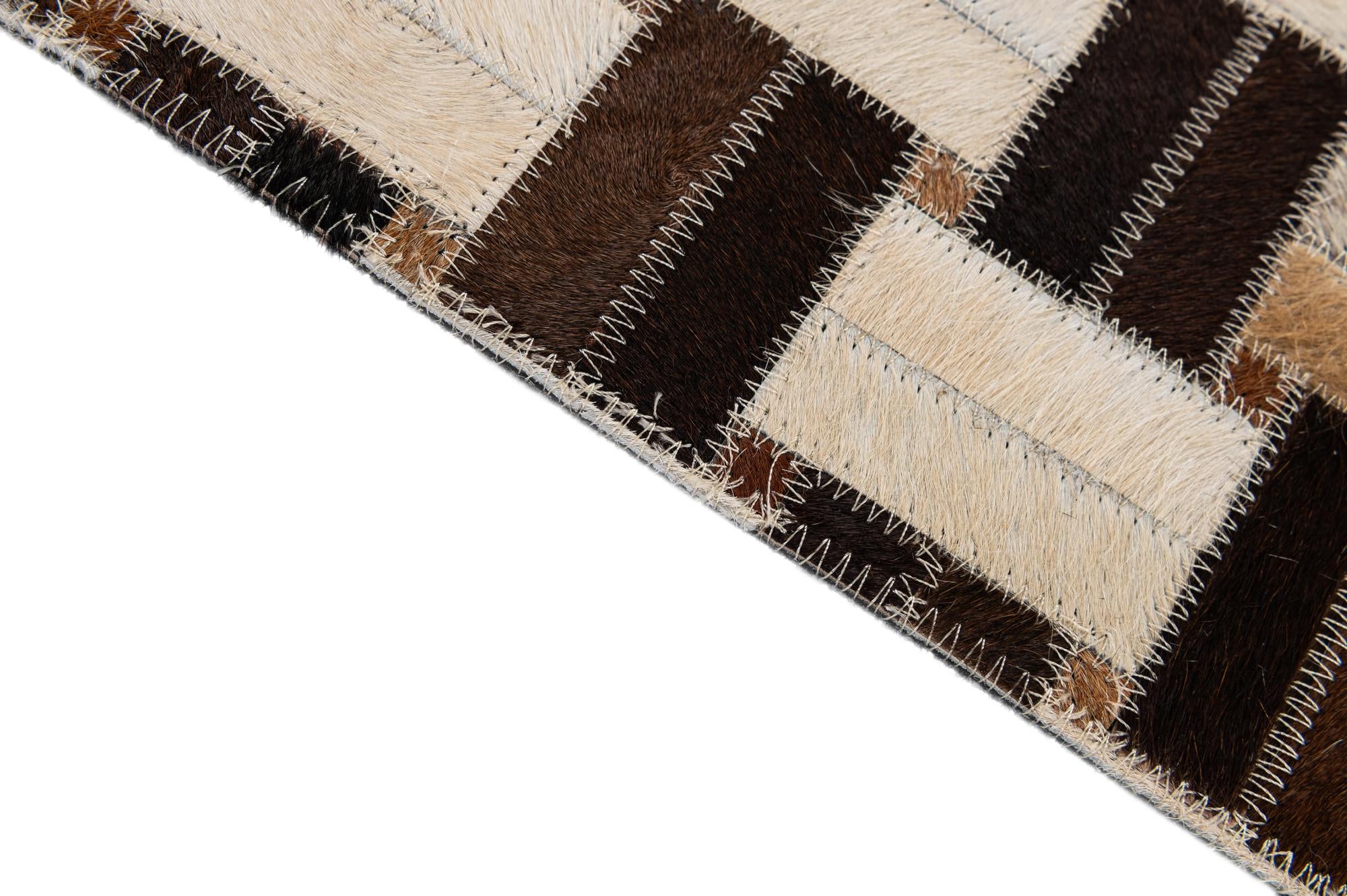 4' 11 x 7' 10 Cowhide - Patchwork Rug