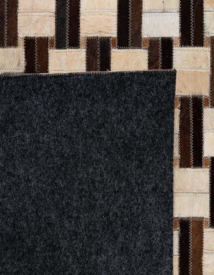 Detail image of 4' 11 x 7' 10 Cowhide - Patchwork Rug