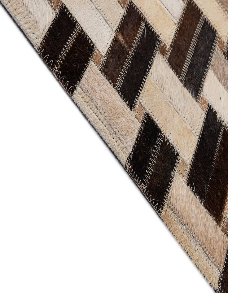 Detail image of 4' 11 x 7' 10 Cowhide - Patchwork Rug