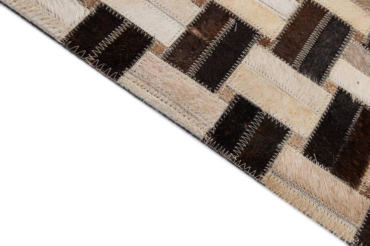 Detail image of 4' 11 x 7' 10 Cowhide - Patchwork Rug