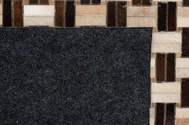4' 11 x 7' 10 Cowhide - Patchwork Rug