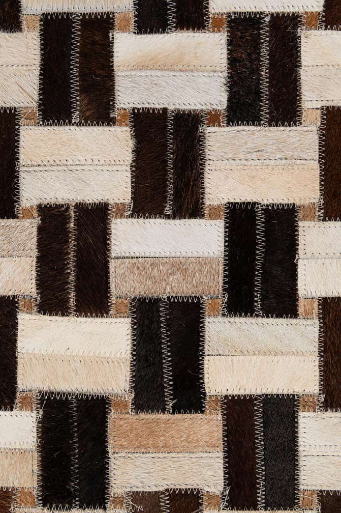 4' 11 x 7' 11 Cowhide - Patchwork Rug