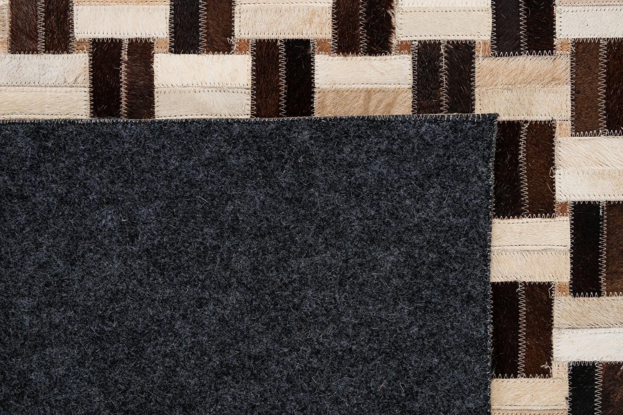 4' 11 x 7' 11 Cowhide - Patchwork Rug