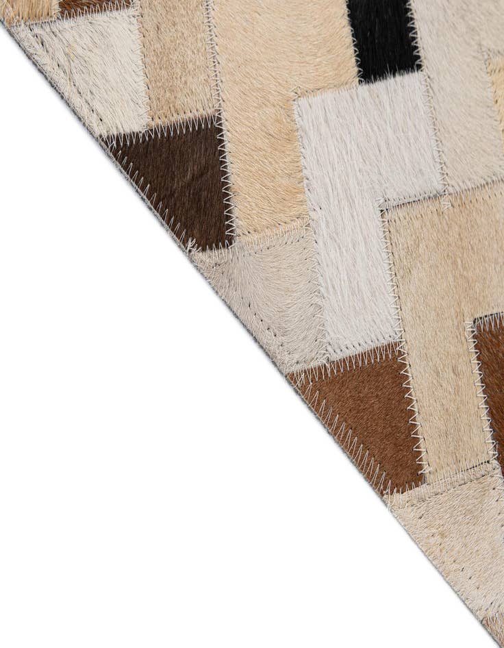 Detail image of 5' 1 x 7' 11 Cowhide - Patchwork Rug