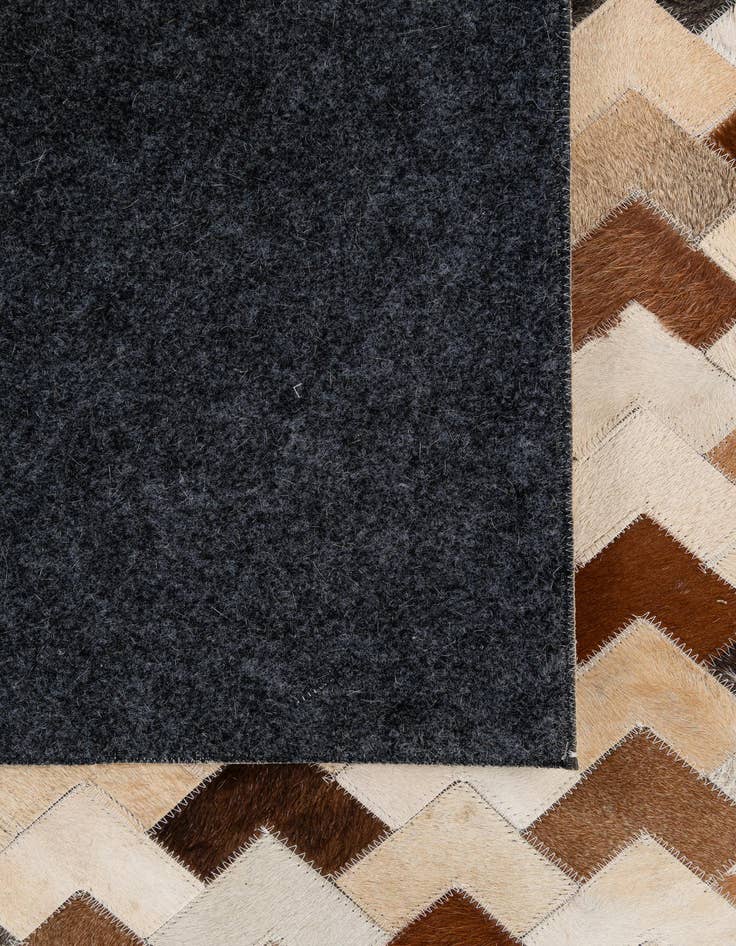 Detail image of 5' 1 x 7' 11 Cowhide - Patchwork Rug