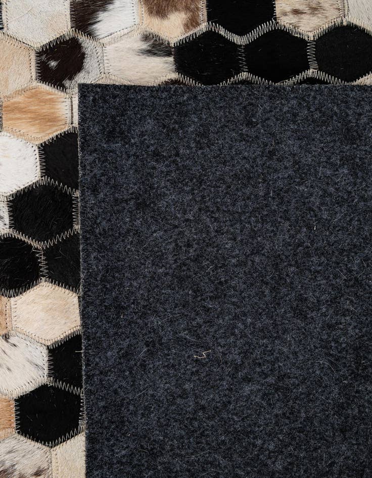 Detail image of 5' 1 x 7' 11 Cowhide - Patchwork Rug