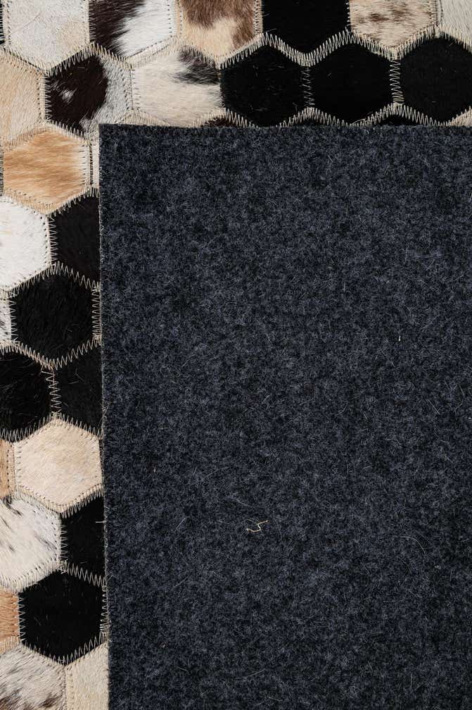 5' 1 x 7' 11 Cowhide - Patchwork Rug