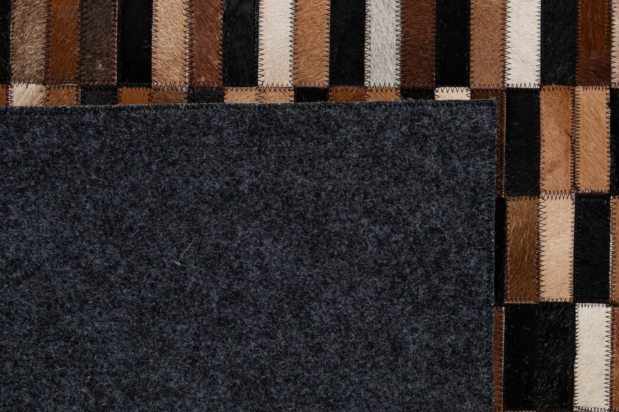 5' 3 x 8' Cowhide - Patchwork Rug