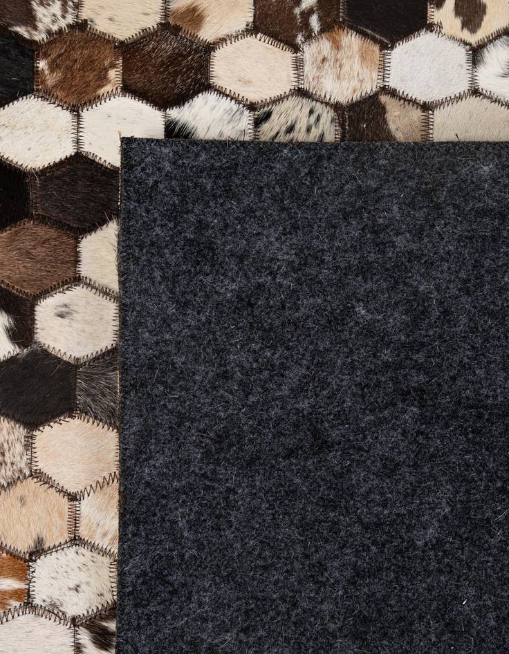 Detail image of 5' 1 x 7' 11 Cowhide - Patchwork Rug