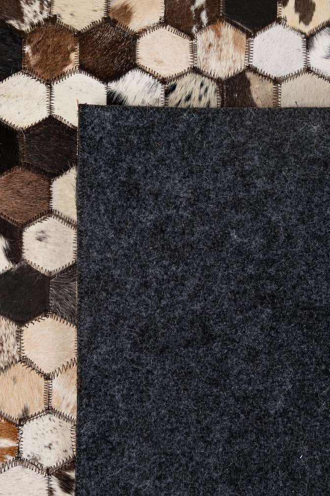 5' 1 x 7' 11 Cowhide - Patchwork Rug